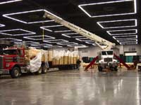 Log Cabin Project at Oregon Convention Center - Portland, Oregon - Boomtruck by Santana Crane