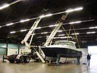 Boat Hanging Restoration Project - Boomtrucks by Santana Crane