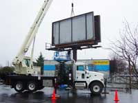 Billboard Replacement and Setting Project - Swingcab Boomtruck by Santana Crane